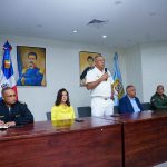 Director General in Juan Pablo Duarte room with Immigration Control personnel