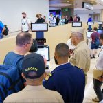 General Director with other DGM authorities at Punta Cana airport, supervising work and interacting with users in transit.