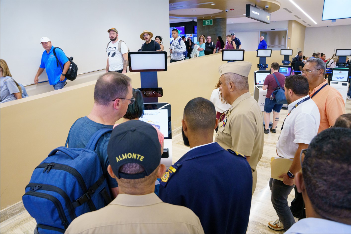 General Director with other DGM authorities at Punta Cana airport, supervising work and interacting with users in transit.