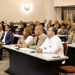 Director General sitting in conference with other authorities