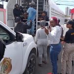Undocumented foreigners boarding a truck after an immigration operation.